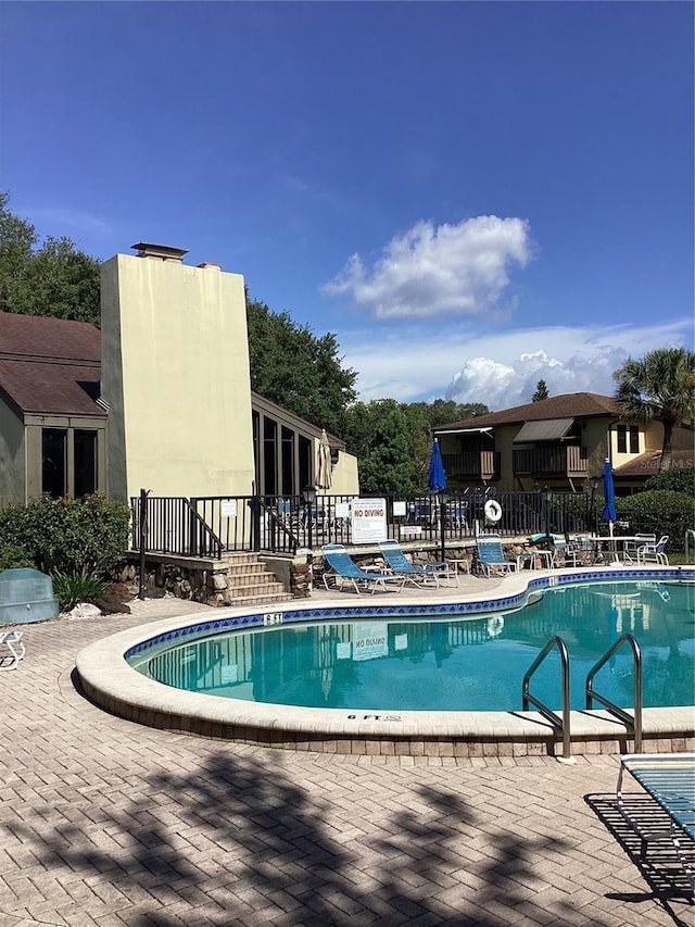 view of pool with a patio