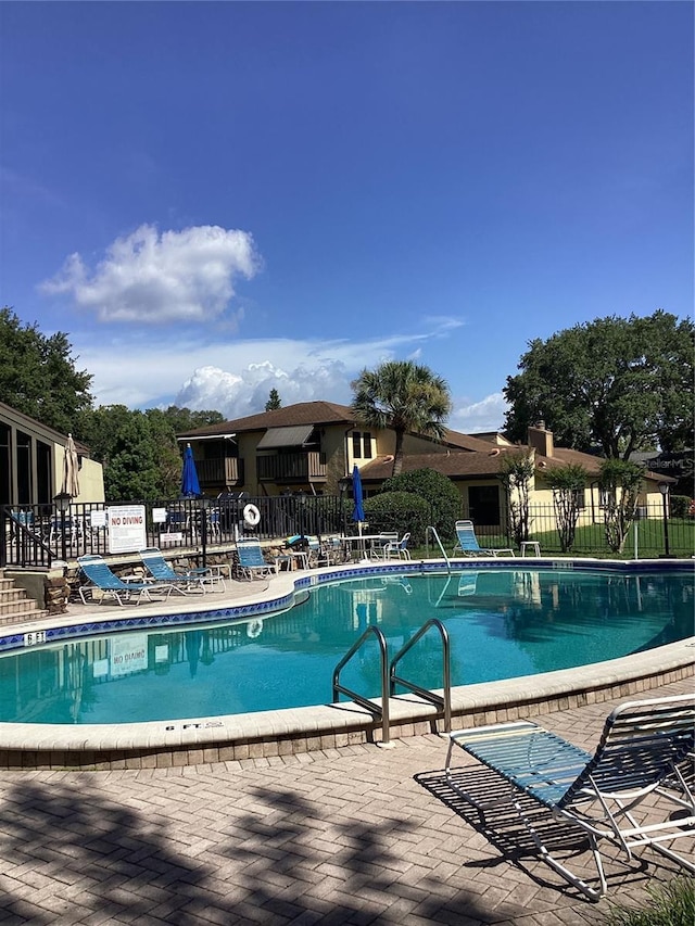 view of pool with a patio