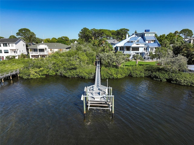 dock area featuring a water view