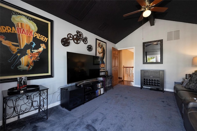 living room with ceiling fan, lofted ceiling, and dark carpet