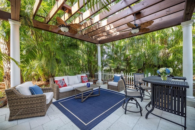 view of terrace with ceiling fan, an outdoor hangout area, and a pergola