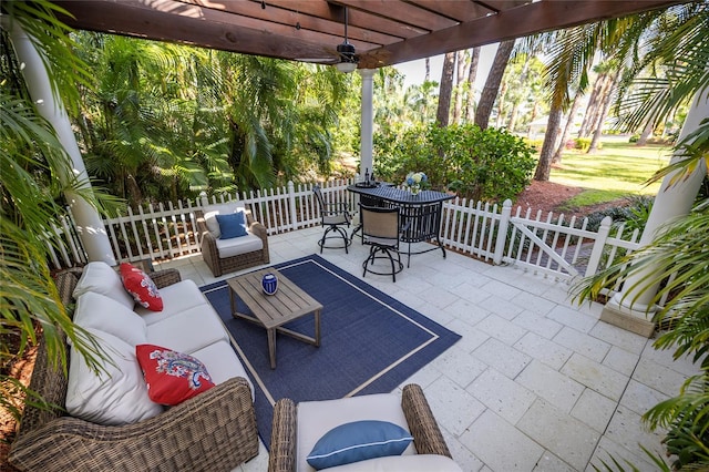 view of patio featuring a pergola and an outdoor hangout area