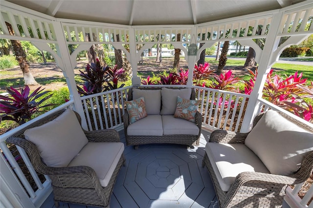 sunroom / solarium with lofted ceiling