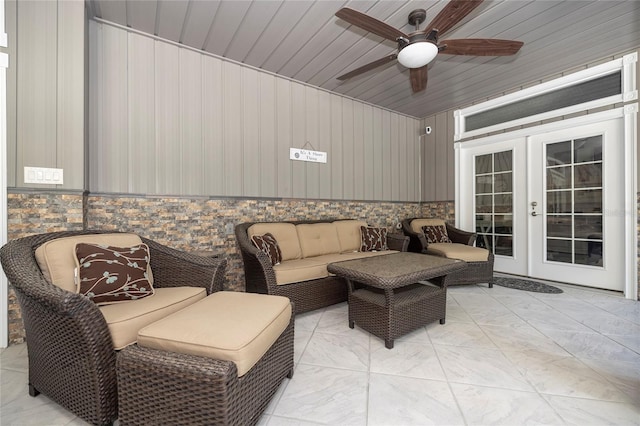 view of patio with ceiling fan and french doors