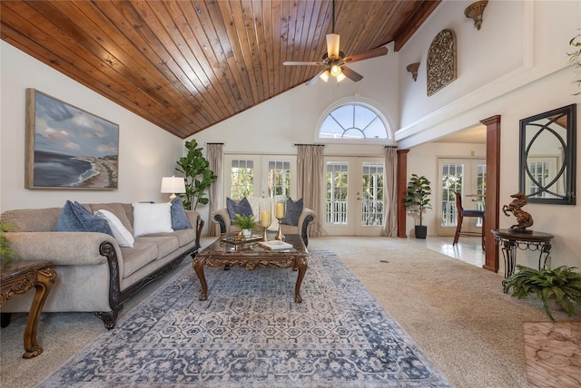 761 Soundview Dr, Palm Harbor, FL 34683 - living area with wood ceiling, a ceiling fan, french doors, high vaulted ceiling, and carpet floors