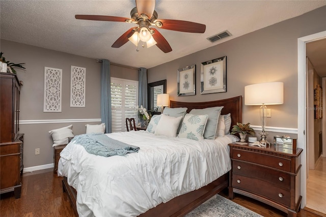 761 Soundview Dr, Palm Harbor, FL 34683 - bedroom featuring wood finished floors, baseboards, and a ceiling fan