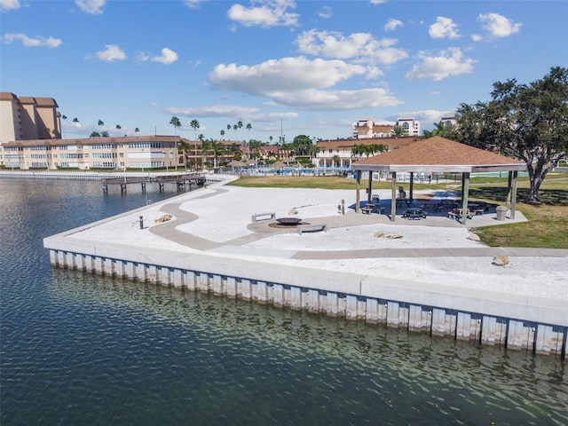 exterior space with a gazebo and a water view