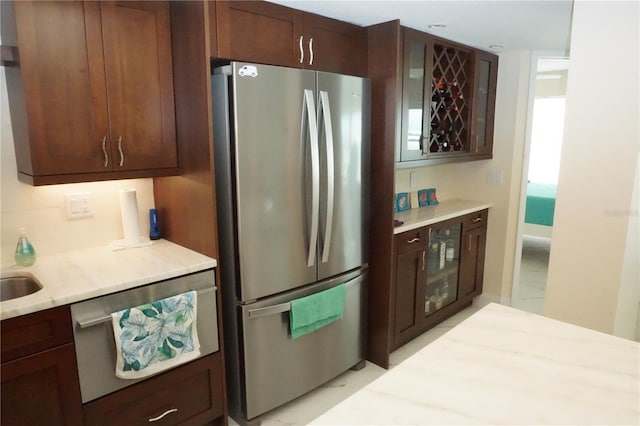 kitchen featuring decorative backsplash and appliances with stainless steel finishes