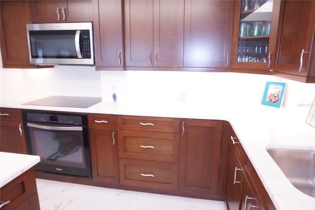 kitchen featuring sink and appliances with stainless steel finishes