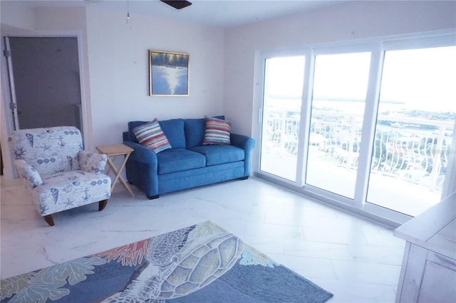 living room featuring ceiling fan