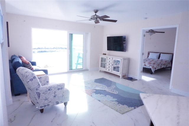 living room with ceiling fan