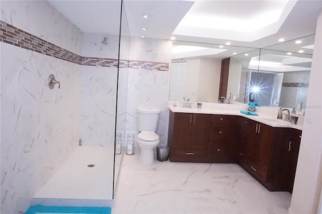 bathroom with vanity, a shower, and tile walls