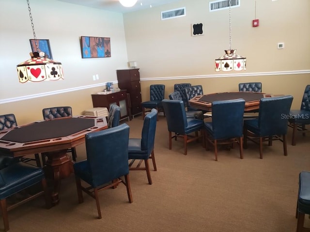 dining area featuring carpet