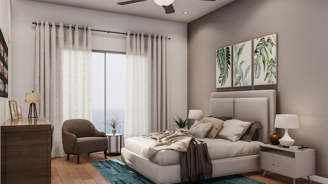 bedroom with ceiling fan and wood-type flooring