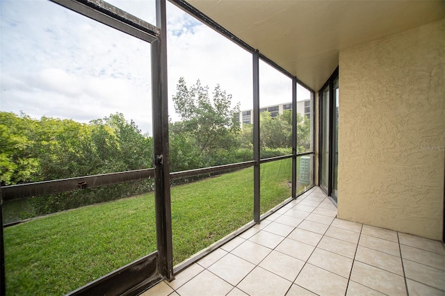 unfurnished sunroom with a wealth of natural light