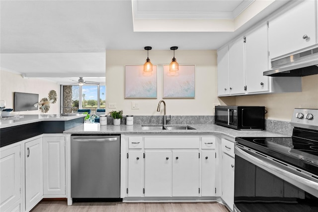 kitchen featuring appliances with stainless steel finishes, ceiling fan, sink, pendant lighting, and white cabinetry