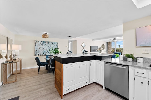 kitchen with dishwasher, kitchen peninsula, ceiling fan, light hardwood / wood-style floors, and white cabinetry