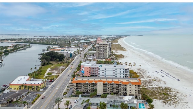 bird's eye view featuring a beach view and a water view