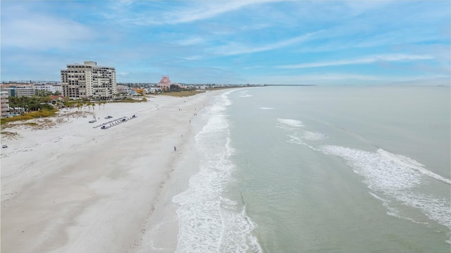 view of road with a beach view and a water view