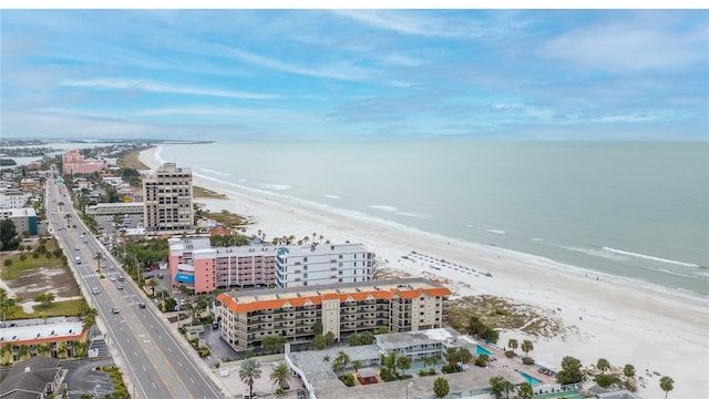 bird's eye view featuring a beach view and a water view