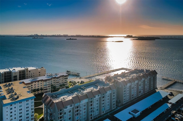 aerial view at dusk with a water view