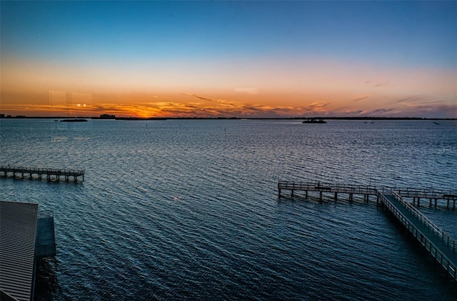 view of dock with a water view