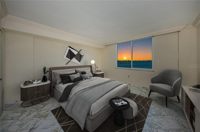 bedroom with ornamental molding and a textured ceiling