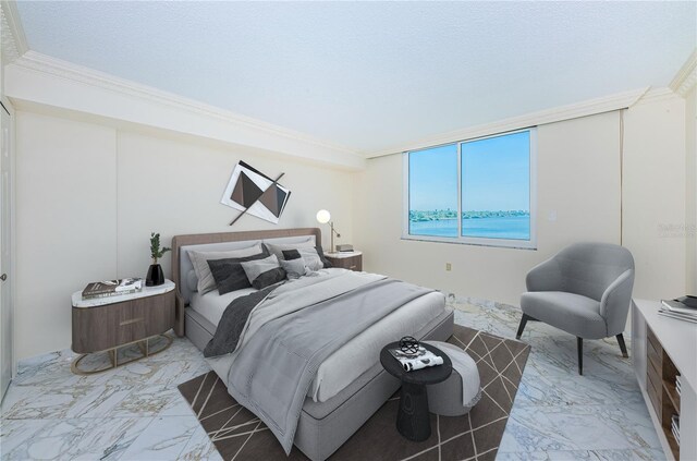 634 Edgewater Dr Unit 644, Dunedin, FL 34698 - bedroom featuring marble finish floor and ornamental molding