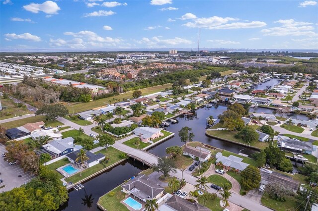 aerial view with a water view and a residential view