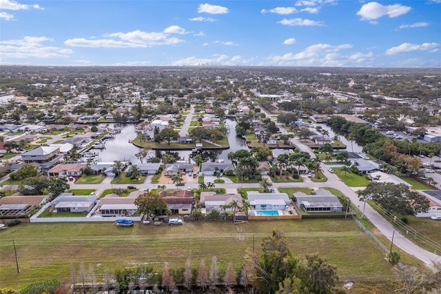 aerial view featuring a water view and a residential view