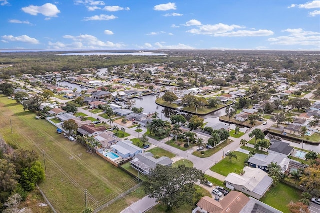 aerial view with a water view and a residential view