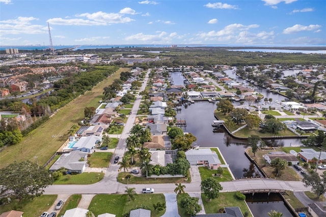 aerial view with a water view and a residential view