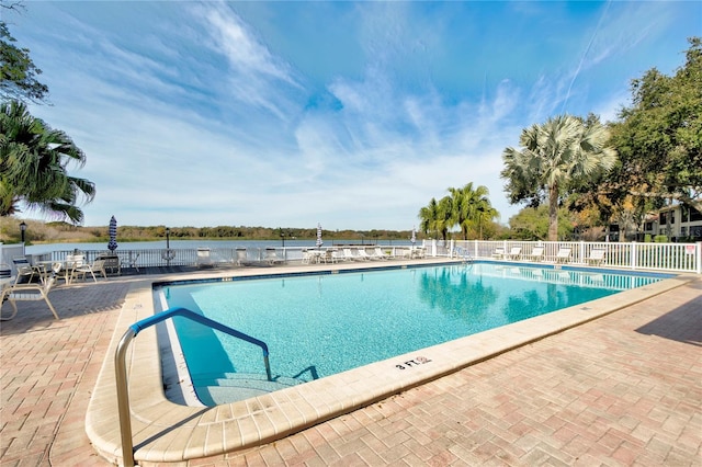 view of swimming pool with a patio area