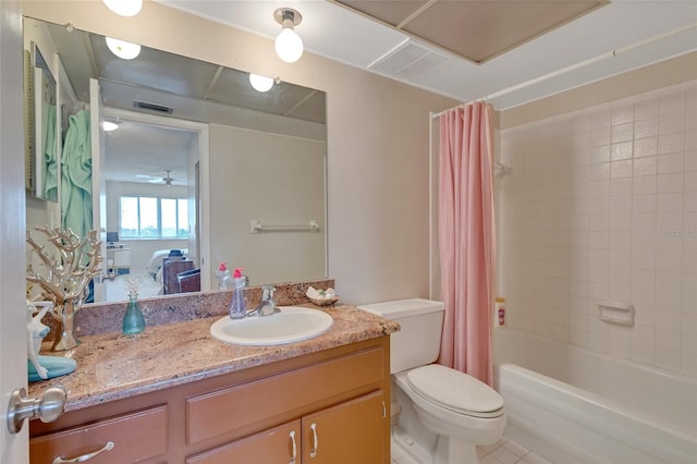 full bathroom with toilet, ceiling fan, tile floors, shower / tub combo with curtain, and oversized vanity