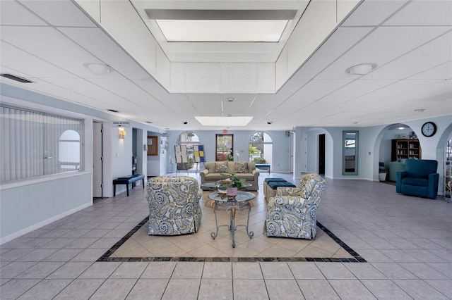 living room featuring light tile floors