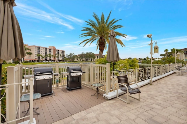 wooden deck featuring grilling area