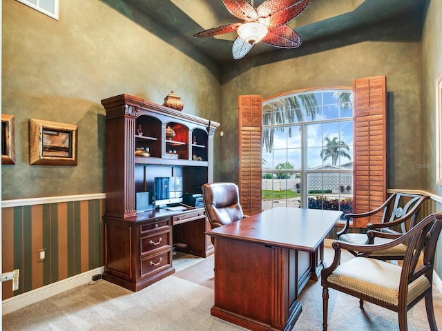 office space with ceiling fan and light colored carpet