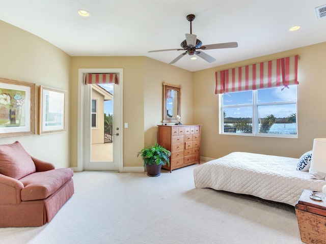 bedroom featuring ceiling fan, carpet, and access to exterior