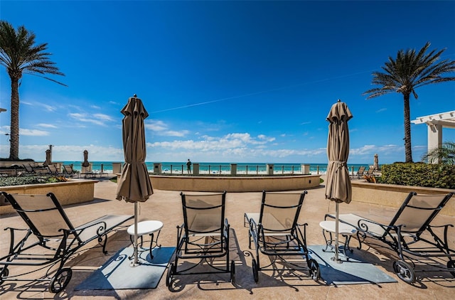 view of patio / terrace with a water view