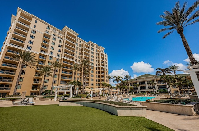 view of property with a community pool