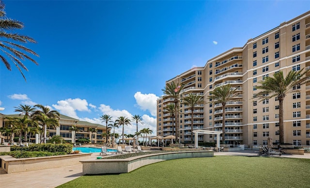 view of property's community with a swimming pool