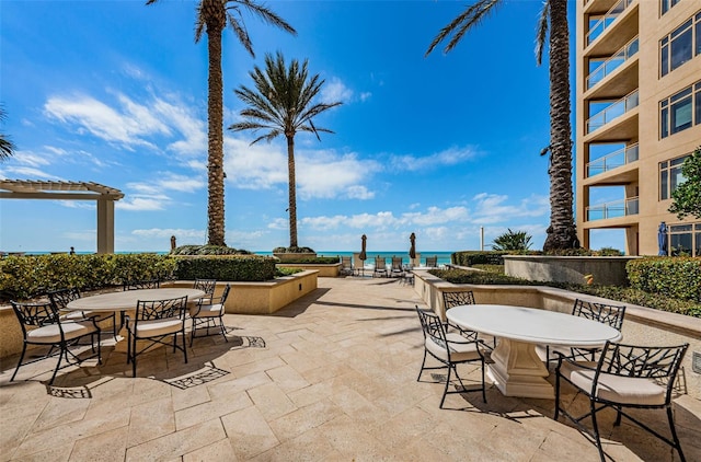 view of patio / terrace with a water view