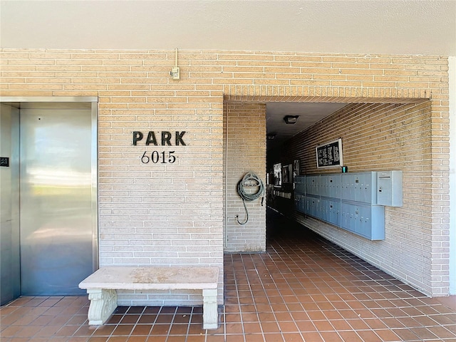 view of exterior entry featuring elevator