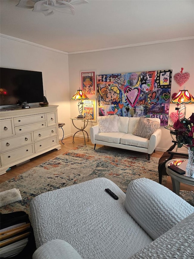 living room featuring crown molding and wood-type flooring