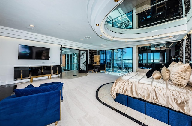 bedroom with a tray ceiling