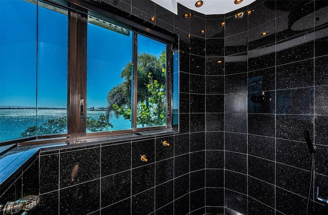 bathroom with a water view