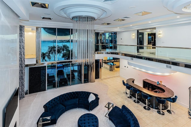 interior space featuring tile flooring and a water view