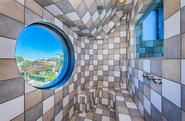 interior space featuring tiled shower