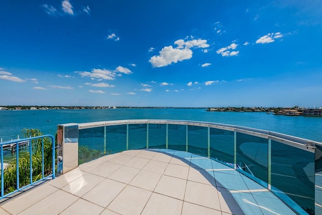 view of terrace featuring a water view