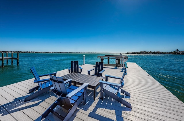 view of dock with a water view